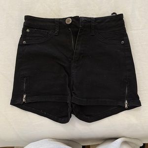 High waisted black jean shorts with side zippers
